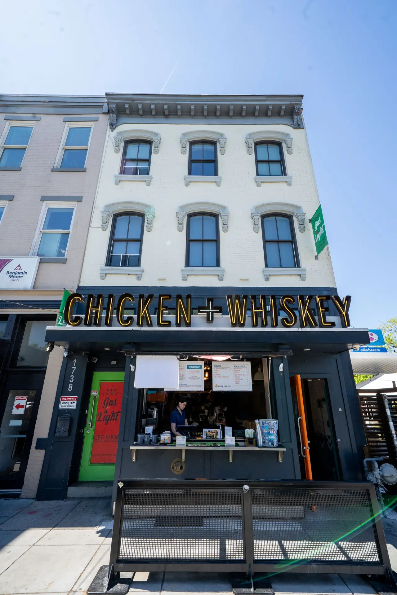 Street view of 1738 14th St NW with the Chicken + Whiskey storefront